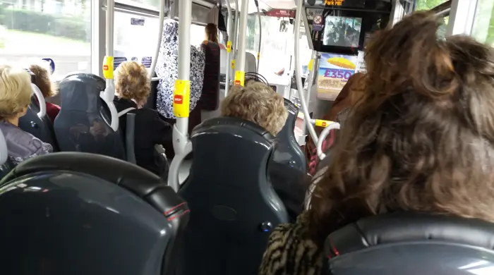Passengers On The 50 Bus