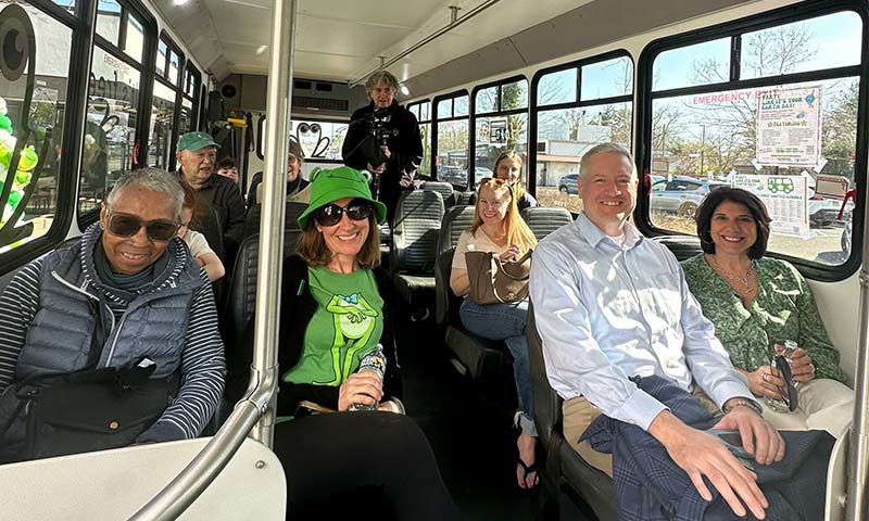 Attendees inside a Princeton loop bus